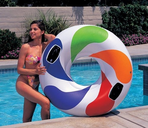 Pink rubber ring in swimming pool Stock Photo by ©phb.cz 10481273